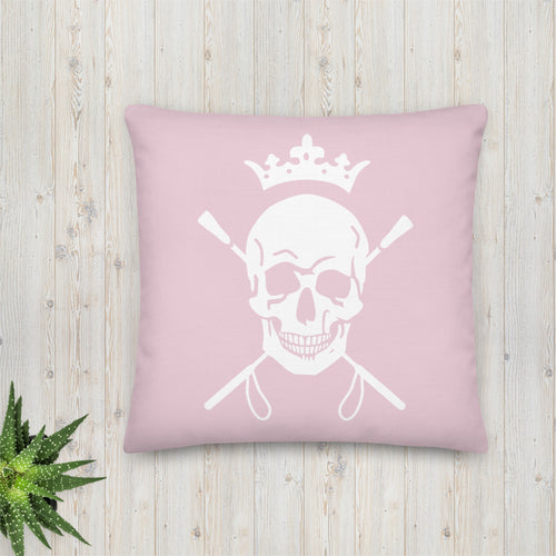 Equestrian Skull and Crops Dec Pillow in Blush Pink on wood floor.